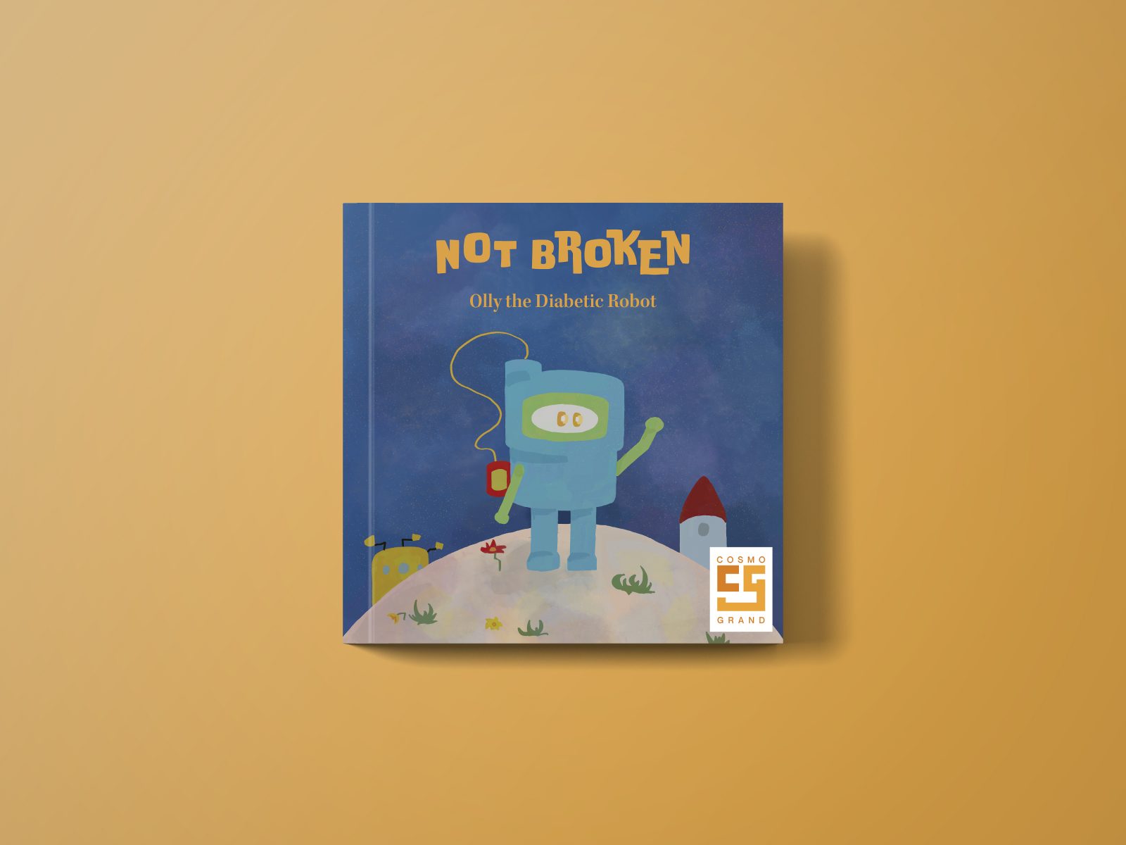 Book cover titled “Not Broken; Olly the Diabetic Robot”, and an image of a blue robot in space.