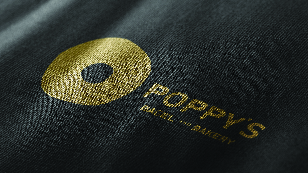 Poppy’s Bagel and Bakery Logo screen-printed on canvas material