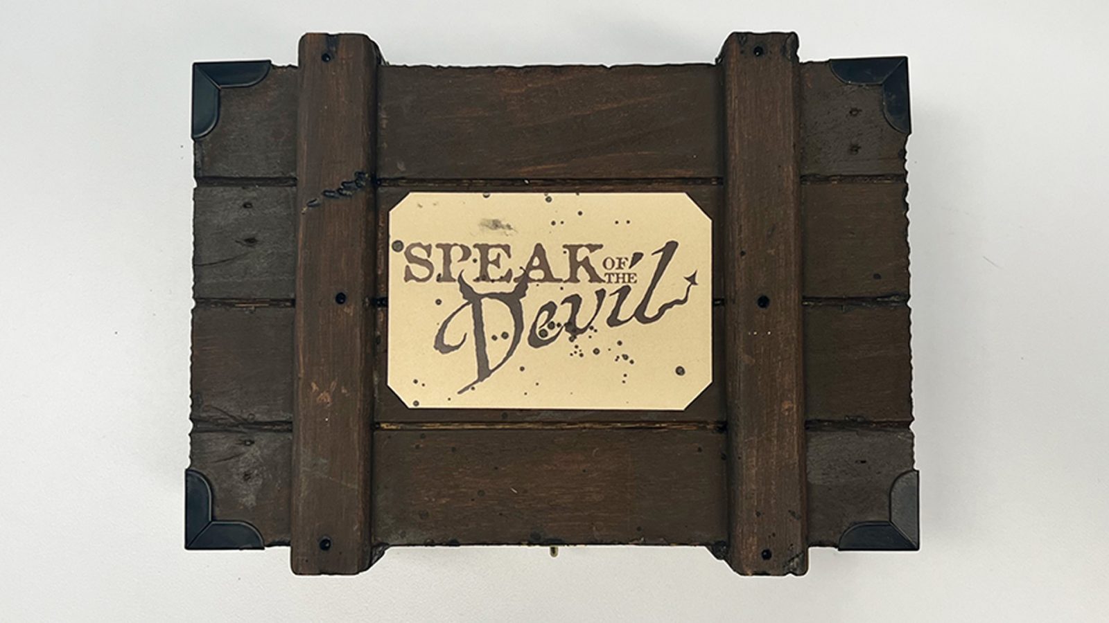 The idiom “Speak of the Devil and they shall appear” and this rendition created is commentary about how everyone has an inner devil or demon and they should acknowledge it, not succumb to it. Leaning into the historical design aspects of wooden boxes, hand lettered script, and stamped fonts allowed for a vintage feel.