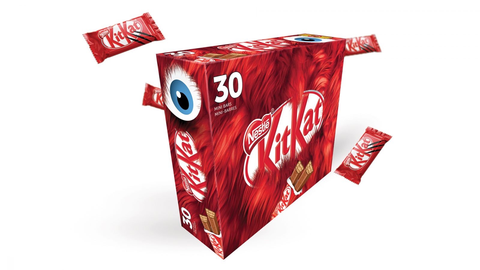 KitKat Halloween box package. The design incorporates a KitKat monster inspired by Gossamer from Looney Tunes which you can only see certain aspect of such as the big menacing eye. The design embeds the the logo in the fur as well as the image of the chocolate bar.